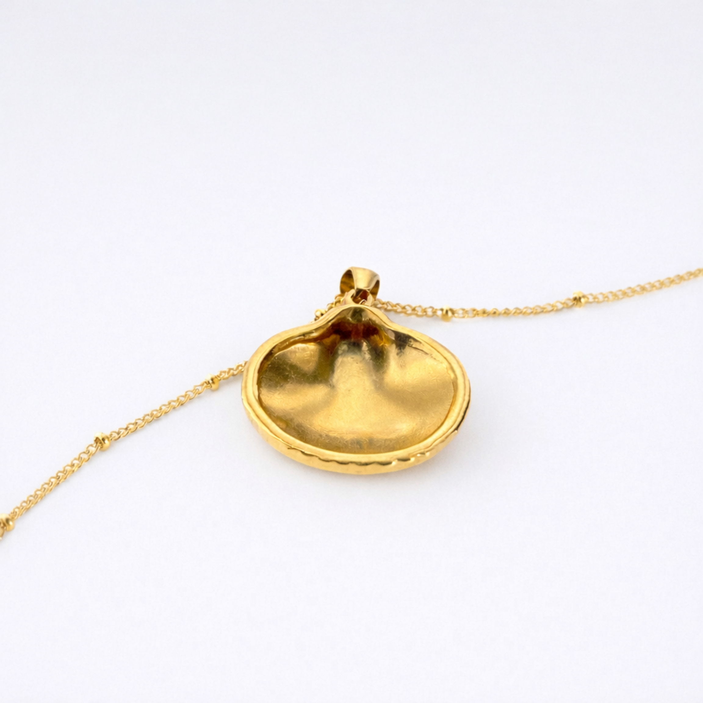 Back detail of 18K gold plated seashell pendant necklace