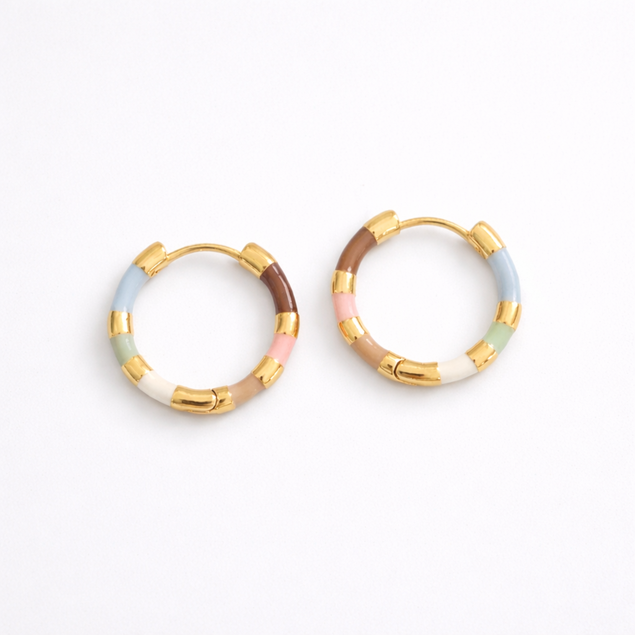 Pastel enamel hoop earrings with gold details
